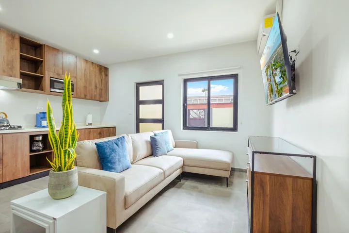Modern cream sofa in a vacation rental living room