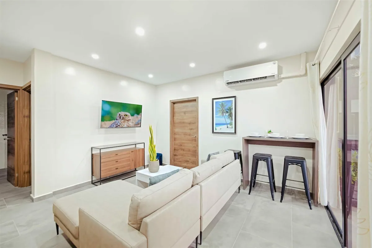 Light-filled living room and breakfast counter in Sea La Vie Suite 4.